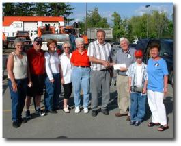 Group photo of the volunteers at the Gananoque A&P May 2001 BBQ Fundraiser